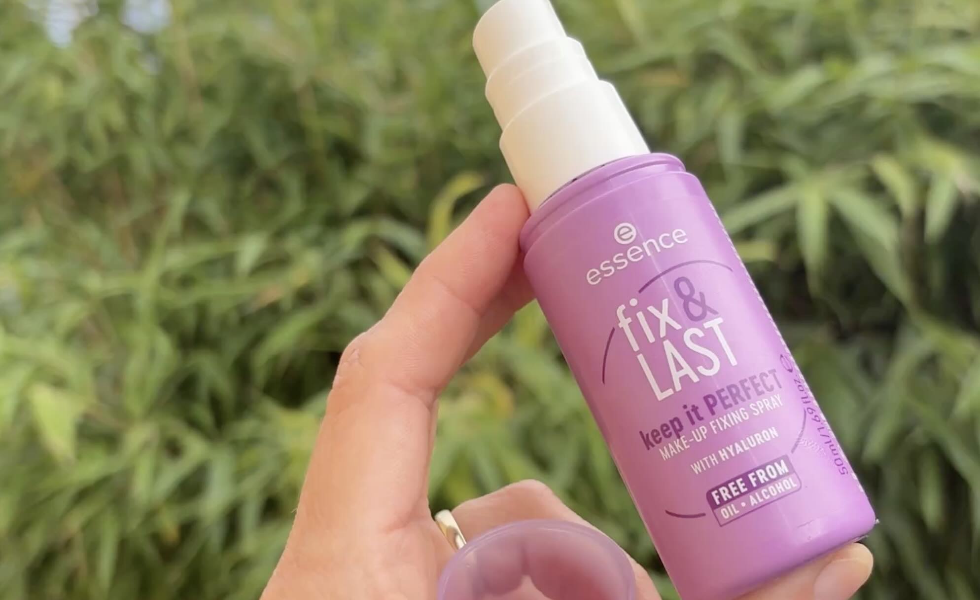 essence setting spray dm